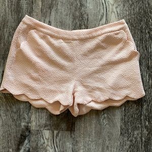 Mauve scalloped back zipper shorts